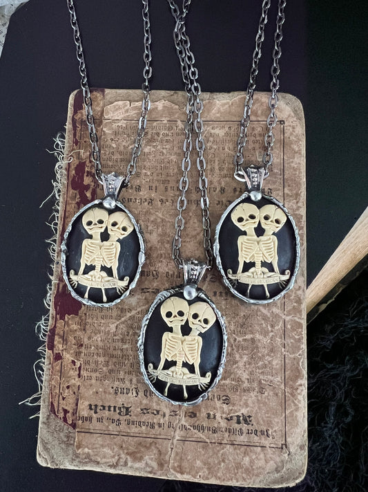 Skeletal Siamese twins cameo  Tiffany technique necklace~